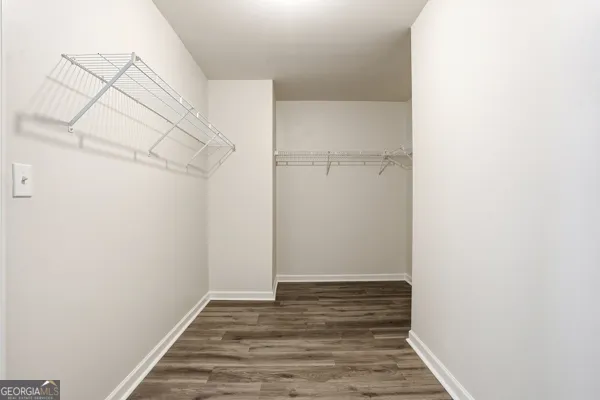 a view of an empty walk in closet