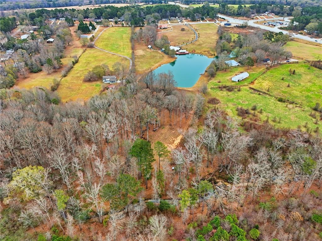 1188 Carl-Bethlehem Road Winder, GA 30680 - Photo 23 of 23 a view of a lake with outdoor space