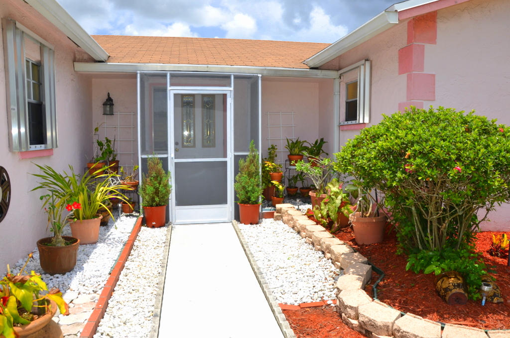 22743 Southwest 55th Avenue Boca Raton, FL 33433 - Photo 3 of 23 Exterior Front 6