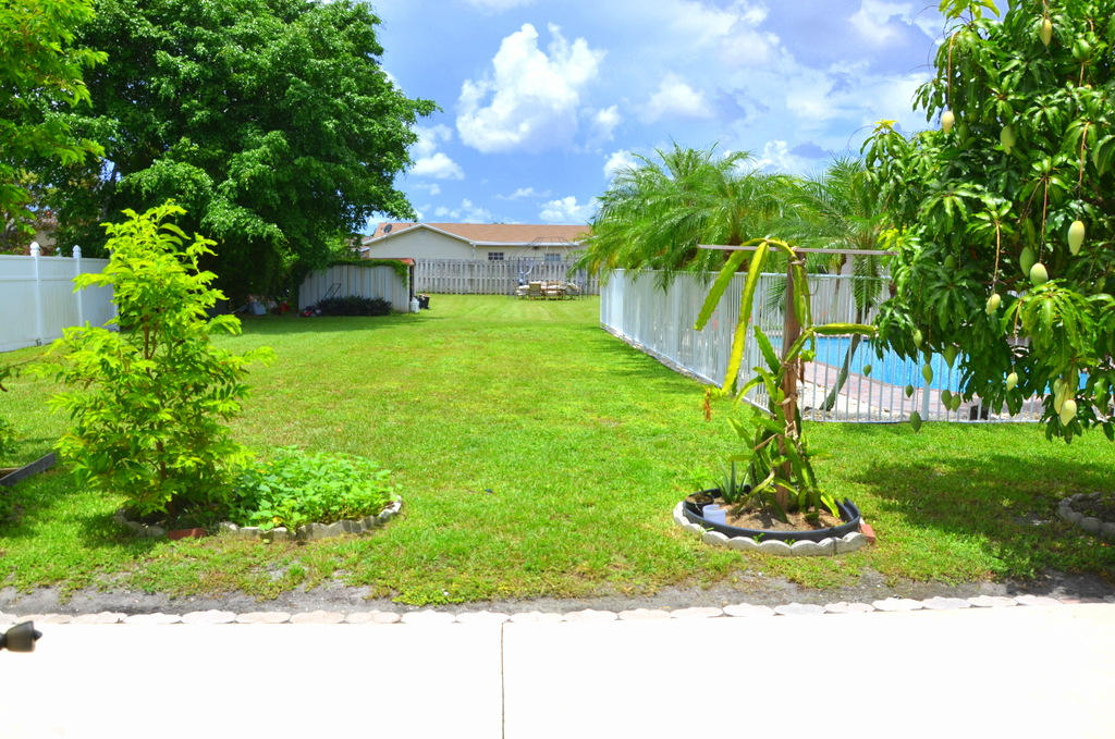 22743 Southwest 55th Avenue Boca Raton, FL 33433 - Photo 4 of 23 Exterior Back 7