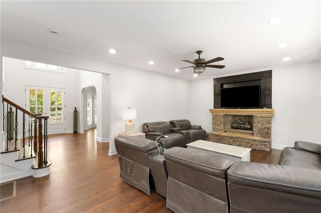4200 Cherry Grove Road Ball Ground, GA 30107 - Photo 22 of 64 a living room with furniture and a flat screen tv