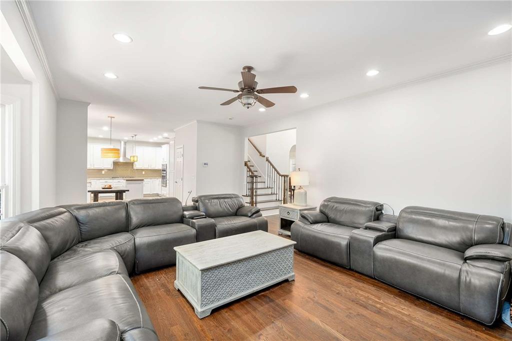 4200 Cherry Grove Road Ball Ground, GA 30107 - Photo 23 of 64 a living room with furniture ceiling fan and a rug