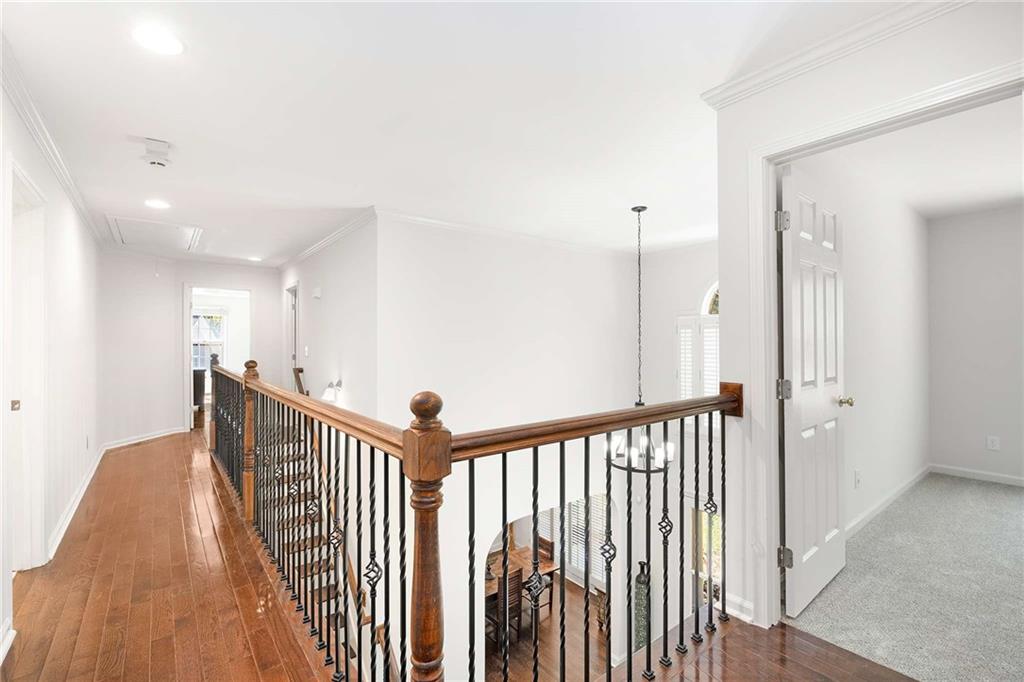 4200 Cherry Grove Road Ball Ground, GA 30107 - Photo 26 of 64 a view of a hallway with a window and stairs