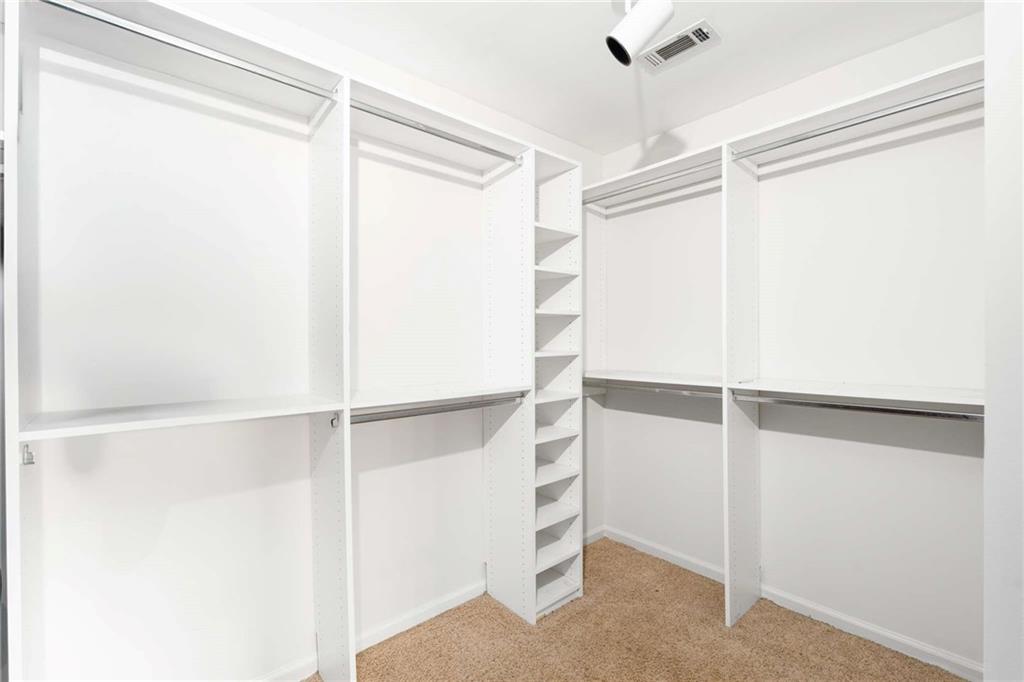 4200 Cherry Grove Road Ball Ground, GA 30107 - Photo 32 of 64 a view of an empty walk in closet