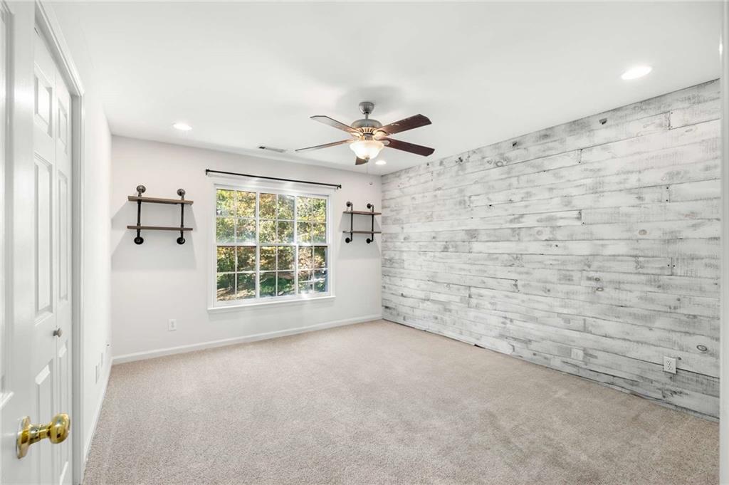 4200 Cherry Grove Road Ball Ground, GA 30107 - Photo 36 of 64 wooden floor in an empty room with a window