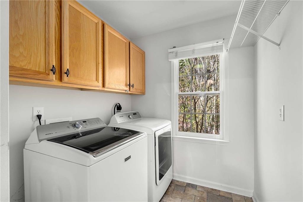 4200 Cherry Grove Road Ball Ground, GA 30107 - Photo 41 of 64 a utility room with dryer and washer