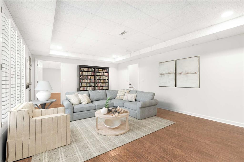 4200 Cherry Grove Road Ball Ground, GA 30107 - Photo 46 of 64 a living room with furniture and a window