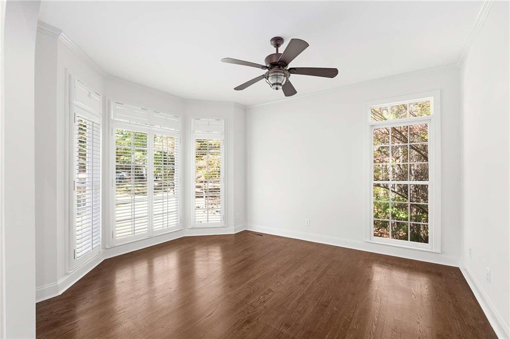 4200 Cherry Grove Road Ball Ground, GA 30107 - Photo 10 of 64 wooden floor in an empty room with a window