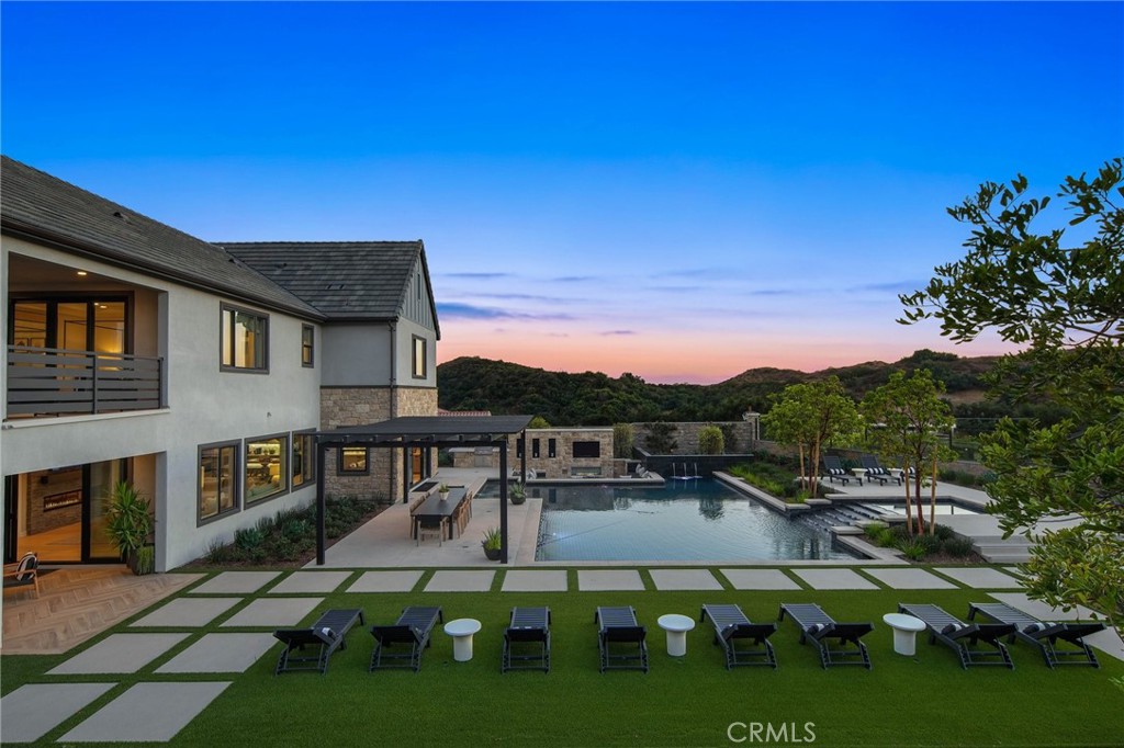 18295 Saddle Crest Silverado, CA 92676 - Photo 3 of 26 a view of a house with a patio