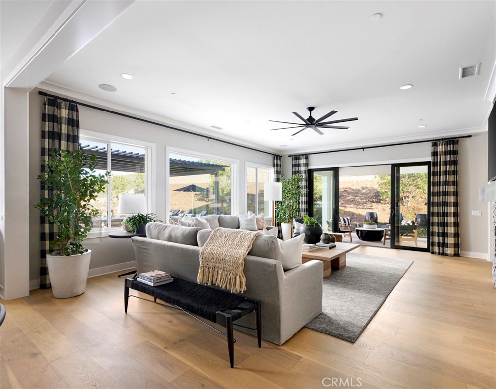 18295 Saddle Crest Silverado, CA 92676 - Photo 7 of 26 a living room with furniture and a large window