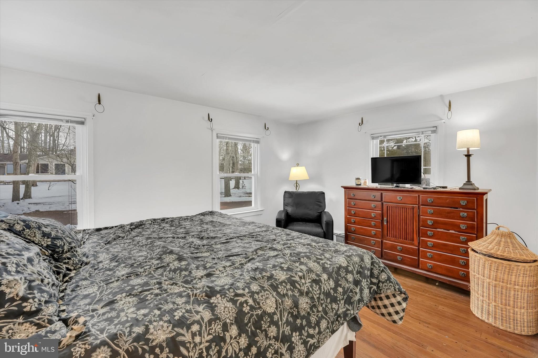 6246 Point Pleasant Pike Doylestown, PA 18902 - Photo 13 of 40 a bedroom with a bed and a television