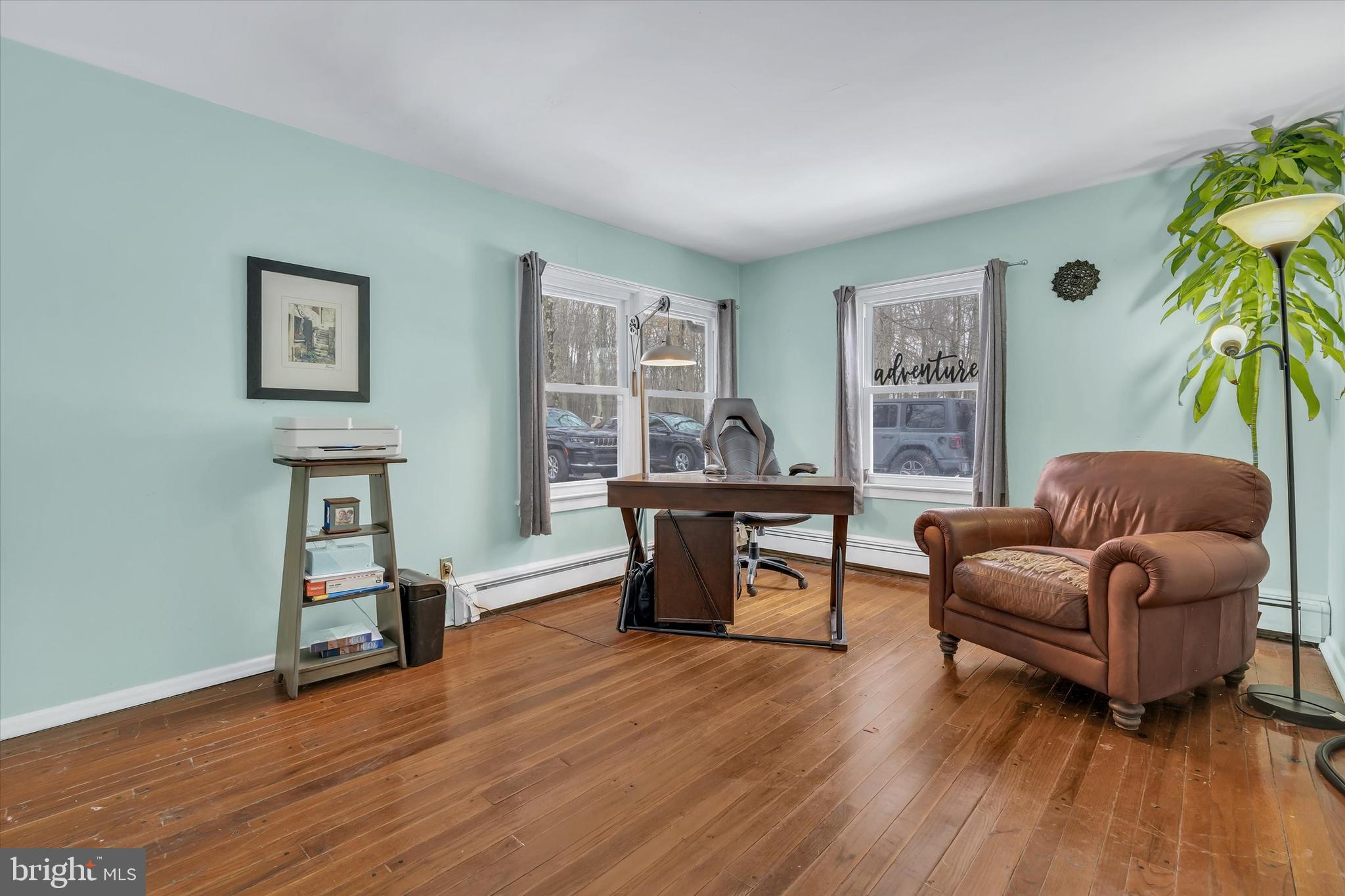 6246 Point Pleasant Pike Doylestown, PA 18902 - Photo 17 of 40 a living room with furniture and a wooden floor
