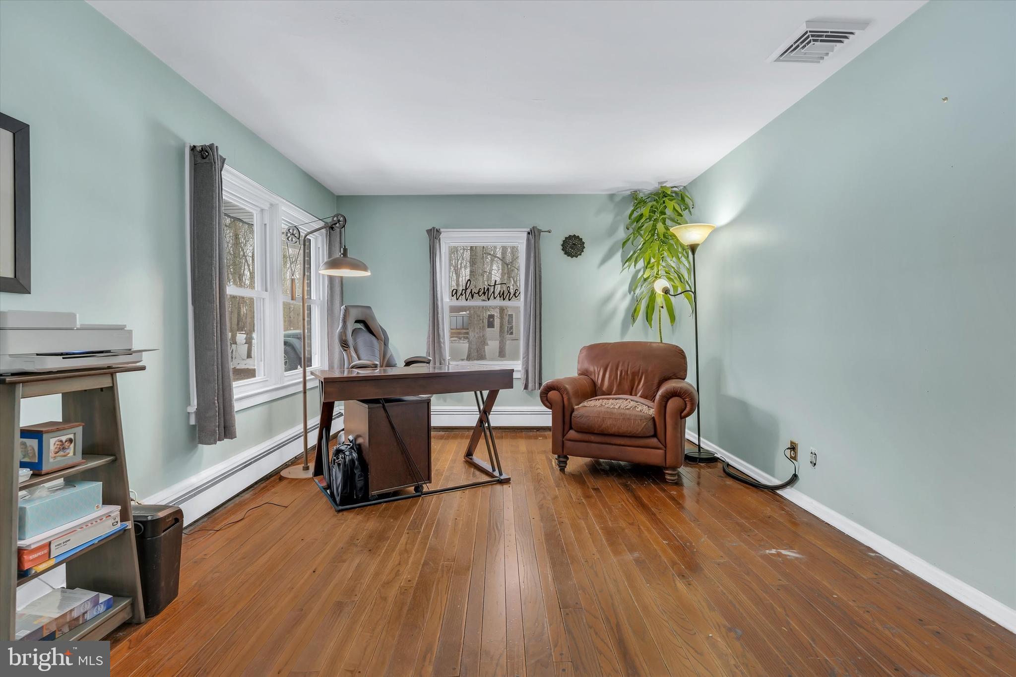 6246 Point Pleasant Pike Doylestown, PA 18902 - Photo 18 of 40 a living room with furniture and a wooden floor