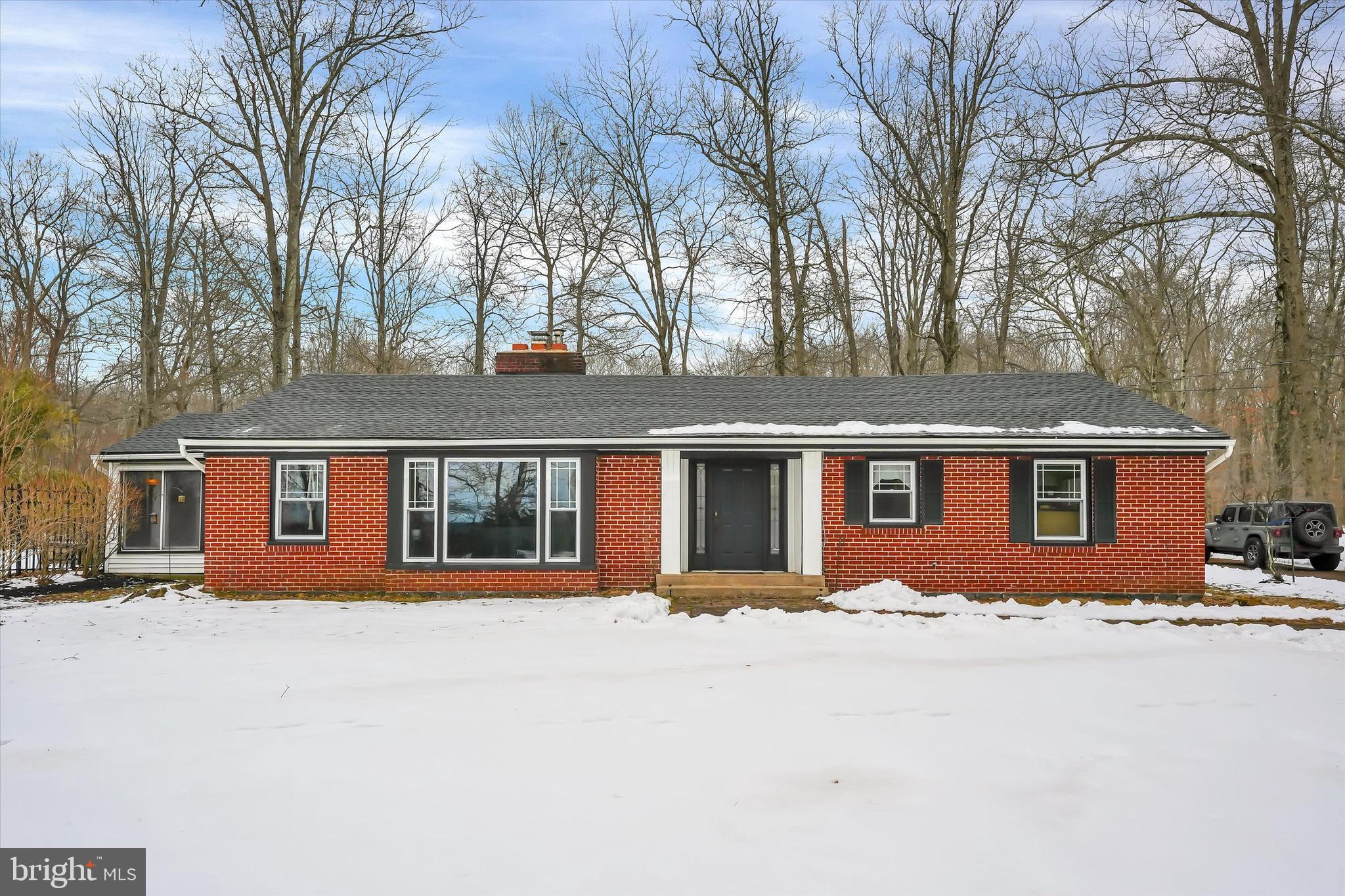 6246 Point Pleasant Pike Doylestown, PA 18902 - Photo 2 of 40 front view of house with a yard
