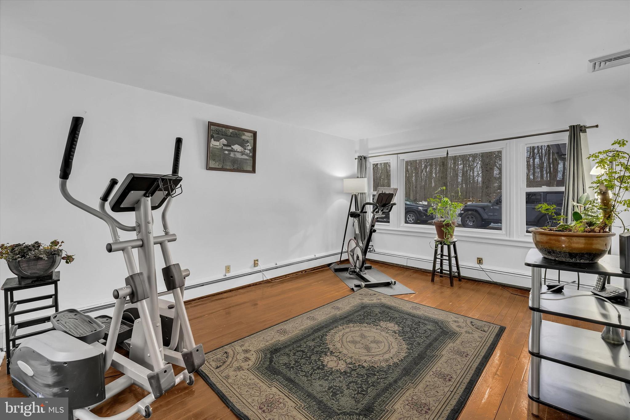 6246 Point Pleasant Pike Doylestown, PA 18902 - Photo 21 of 40 a room with gym equipment and a table