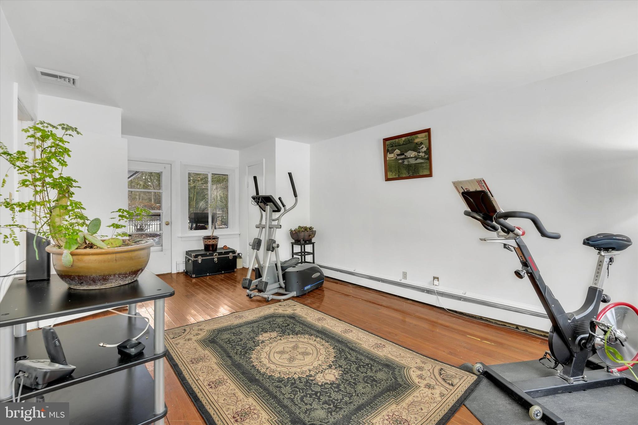 6246 Point Pleasant Pike Doylestown, PA 18902 - Photo 23 of 40 a room with furniture and potted plant