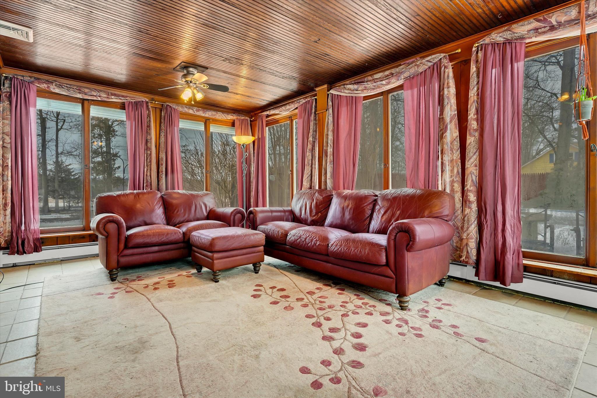 6246 Point Pleasant Pike Doylestown, PA 18902 - Photo 24 of 40 a living room with furniture and a large window