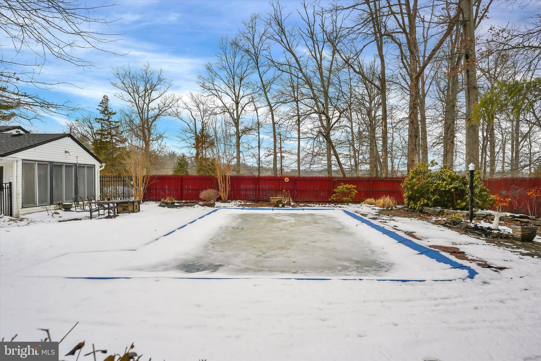 6246 Point Pleasant Pike Doylestown, PA 18902 - Photo 30 of 40 a street view with wooden fence