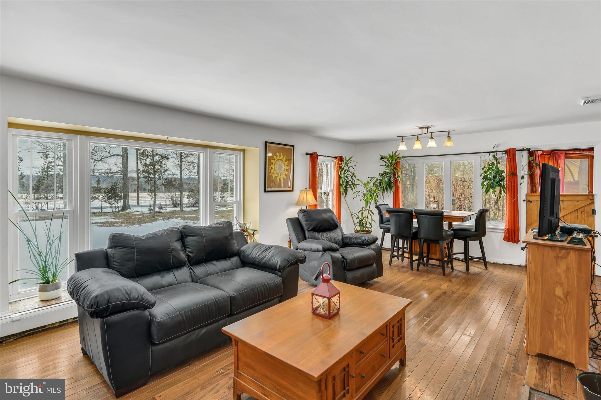 6246 Point Pleasant Pike Doylestown, PA 18902 - Photo 6 of 40 a living room with furniture and a large window
