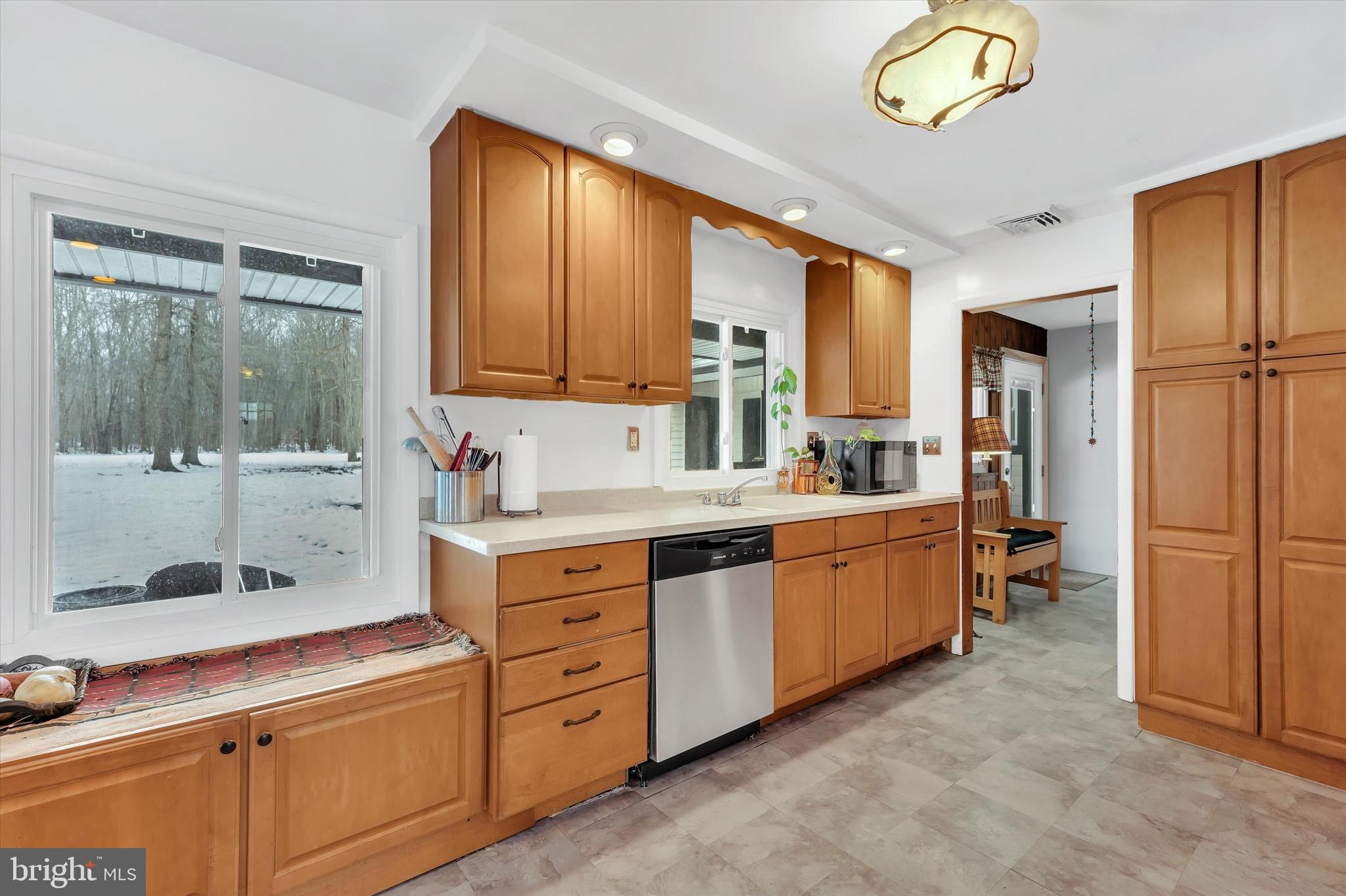 6246 Point Pleasant Pike Doylestown, PA 18902 - Photo 9 of 40 a kitchen with cabinets a sink and appliances