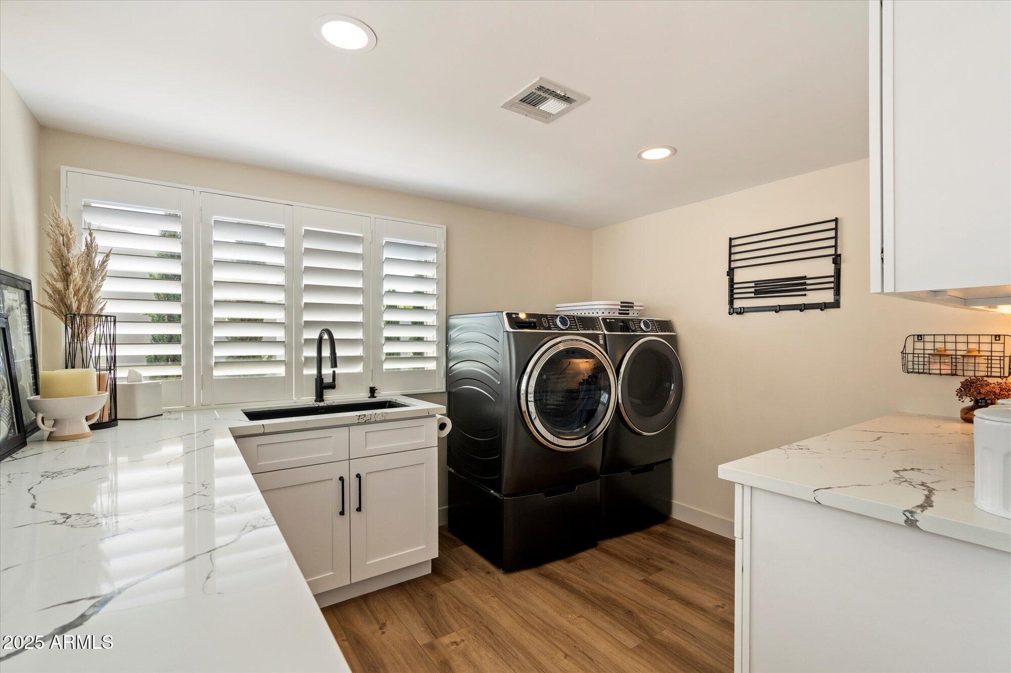 4502 East Exeter Boulevard Phoenix, AZ 85018 - Photo 28 of 48 Laundry Room with Storage