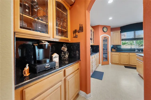 a view of living room with a large window and furniture