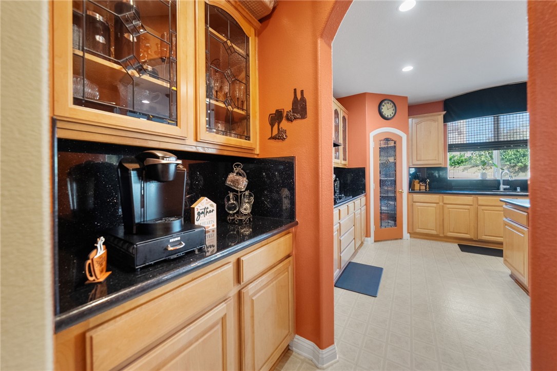 6920 Channel Court Eastvale, CA 91752 - Photo 11 of 57 a view of living room with a large window and furniture