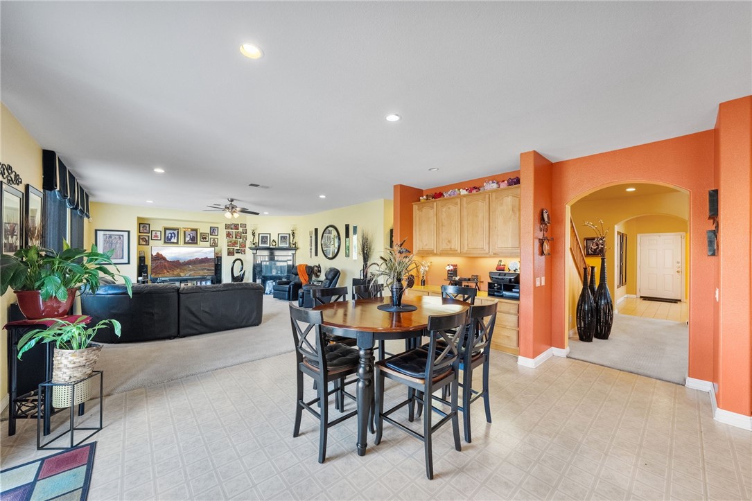 6920 Channel Court Eastvale, CA 91752 - Photo 12 of 57 a view of a dining room with furniture