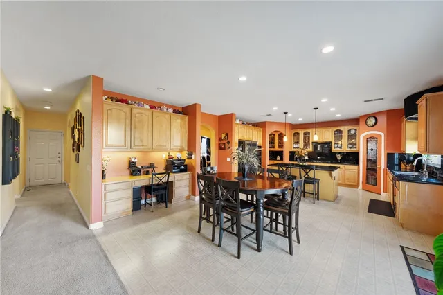 a view of a dining room with furniture