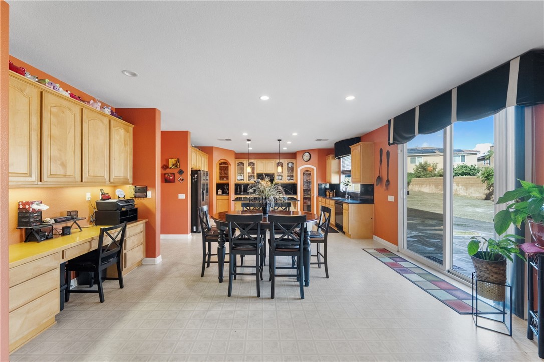6920 Channel Court Eastvale, CA 91752 - Photo 20 of 57 a view of a dining room with furniture window and outside view