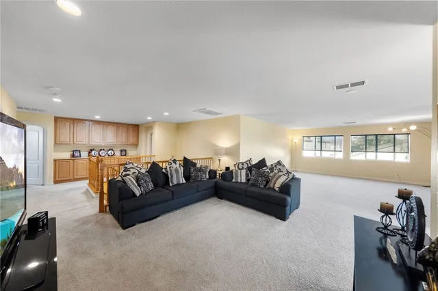 a bathroom with a sink a mirror and a shower
