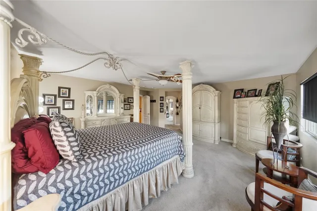 an aerial view of a house with a swimming pool