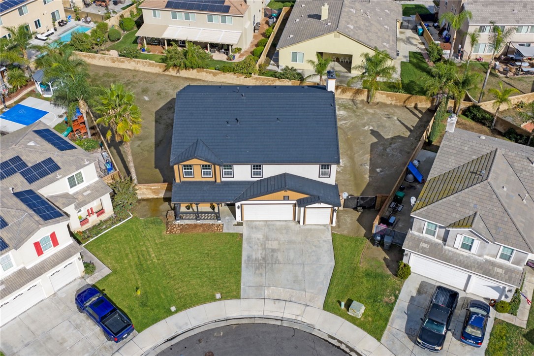 6920 Channel Court Eastvale, CA 91752 - Photo 48 of 57 an aerial view of a house with garden