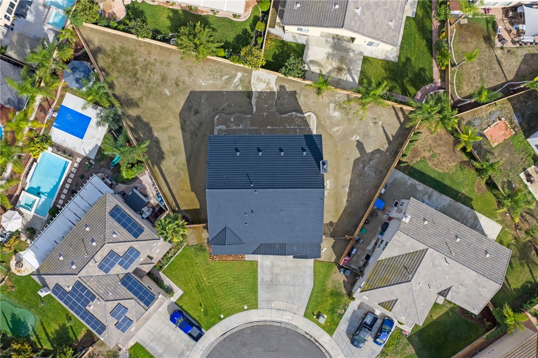 6920 Channel Court Eastvale, CA 91752 - Photo 50 of 57 an aerial view of a house with a yard