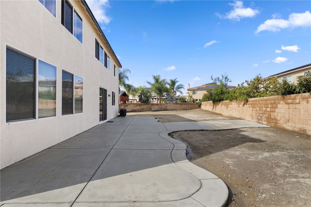 6920 Channel Court Eastvale, CA 91752 - Photo 52 of 57 a view of a street with seating space