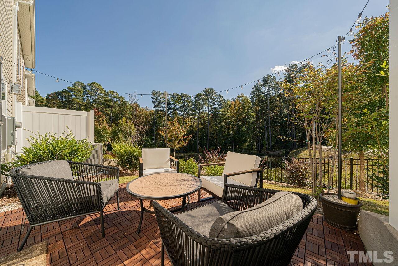 6343 Grace Lily Drive Raleigh, NC 27607 - Photo 23 of 24 a view of a patio in backyard