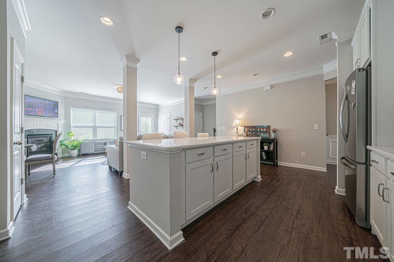 6343 Grace Lily Drive Raleigh, NC 27607 - Photo 7 of 24 a large kitchen with a lot of counter space