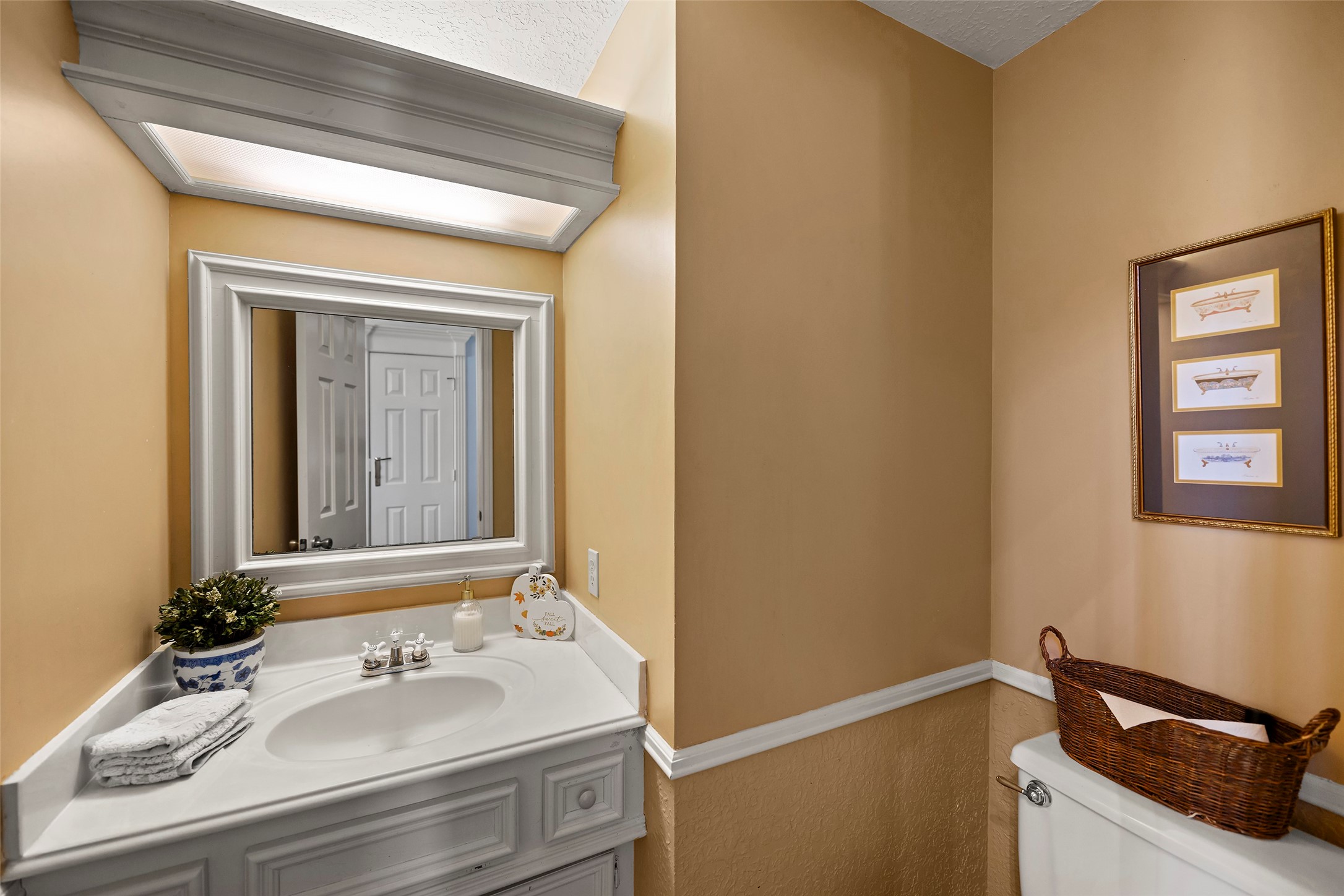 17607 Terrawren Lane Spring, TX 77379 - Photo 15 of 32 a bathroom with a sink and a mirror