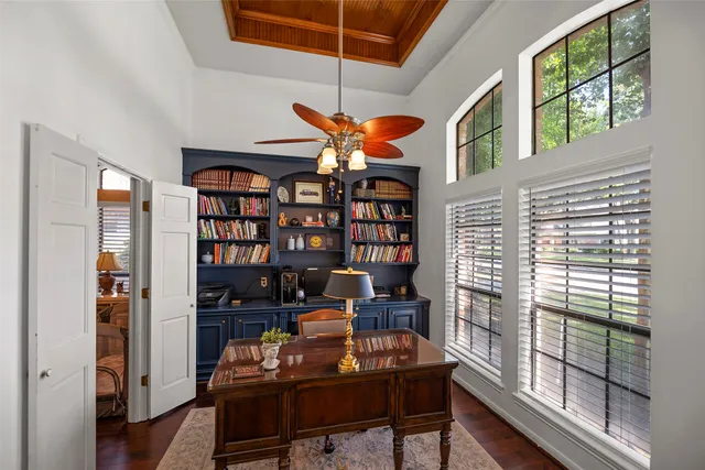 a room with furniture and a book shelf