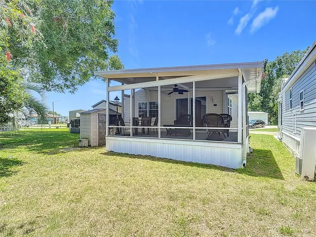 a view of a house with a swimming pool