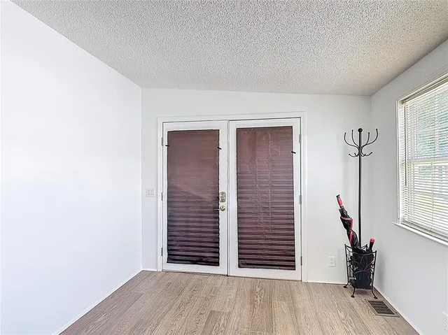 an empty room with windows