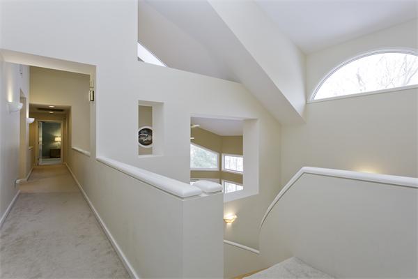 328 Border Road Concord, MA 01742 - Photo 13 of 14 a view of a hallway with windows