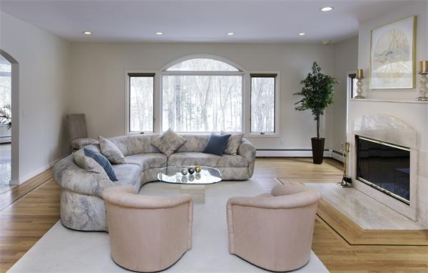 328 Border Road Concord, MA 01742 - Photo 4 of 14 a living room with furniture and a fireplace