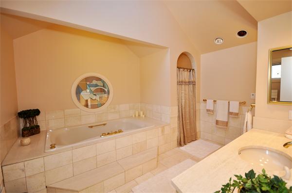 328 Border Road Concord, MA 01742 - Photo 9 of 14 a spacious bathroom with a tub sink and mirror