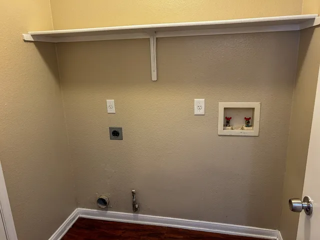 a view of small space with racks on the wall