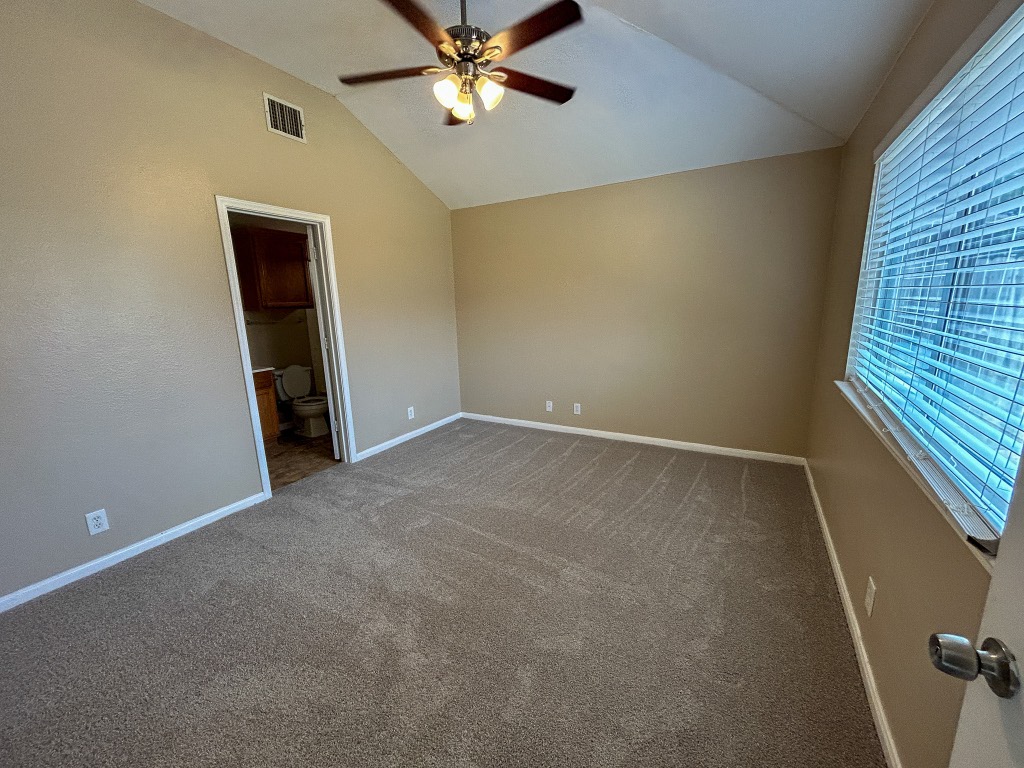1604 Harness Race Way Pflugerville, TX 78660 - Photo 14 of 25 a view of an empty room with a window