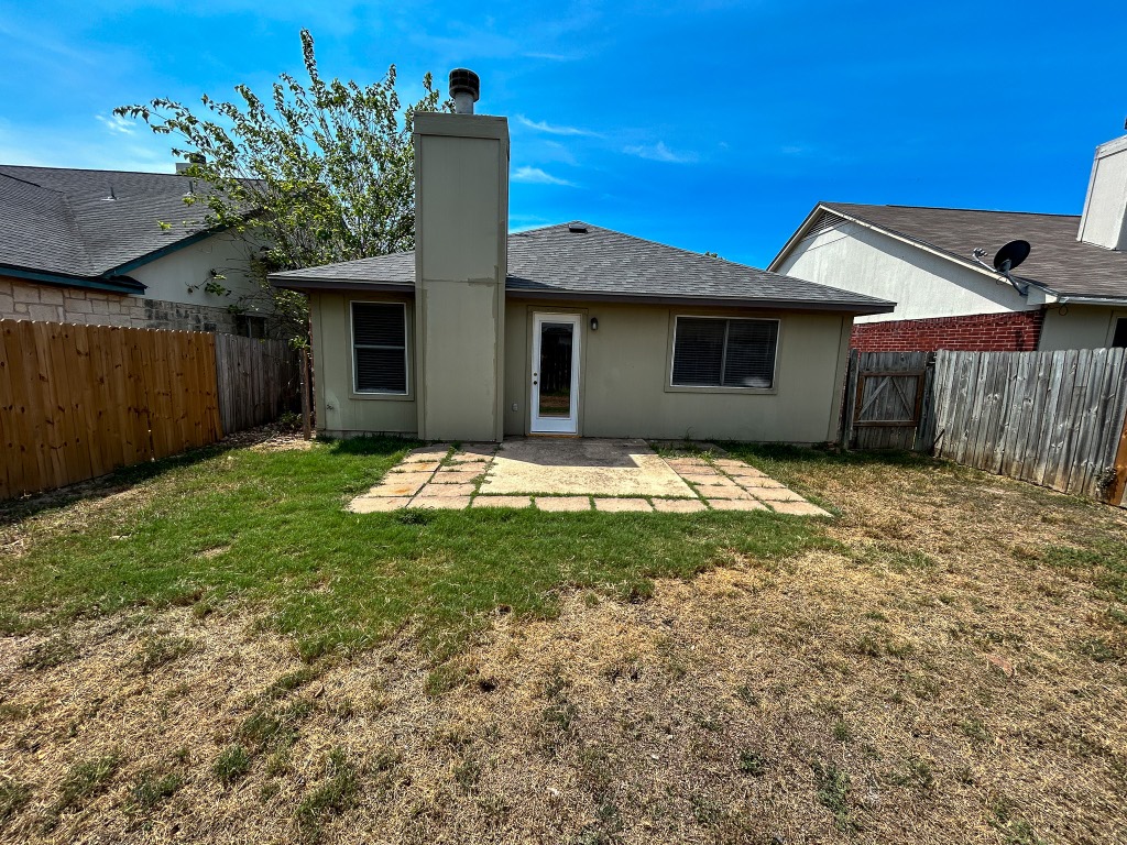 1604 Harness Race Way Pflugerville, TX 78660 - Photo 24 of 25 a house view with a garden space