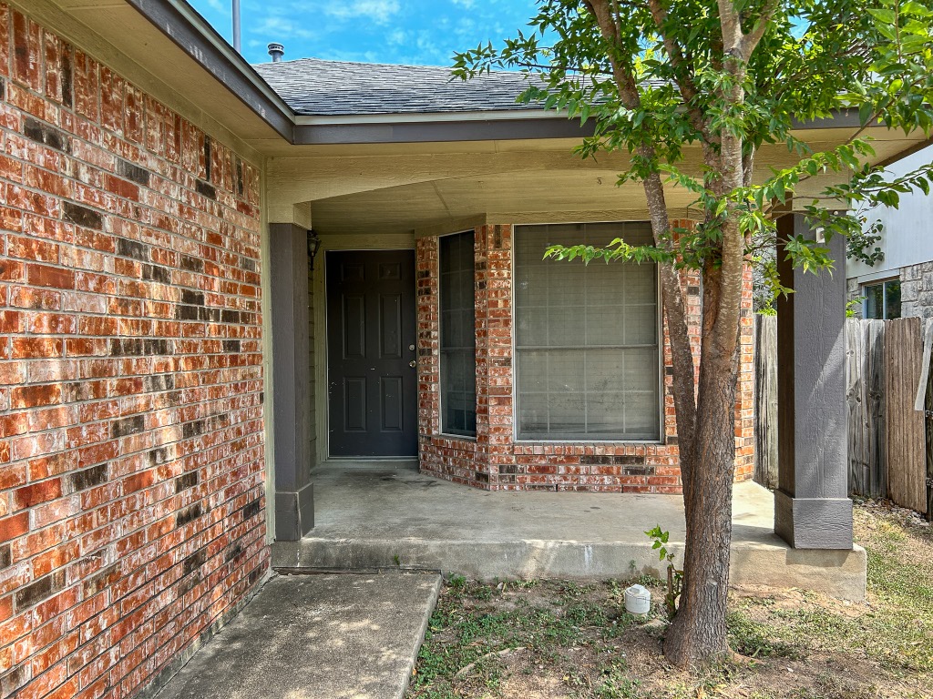 1604 Harness Race Way Pflugerville, TX 78660 - Photo 3 of 25 a front view of a building