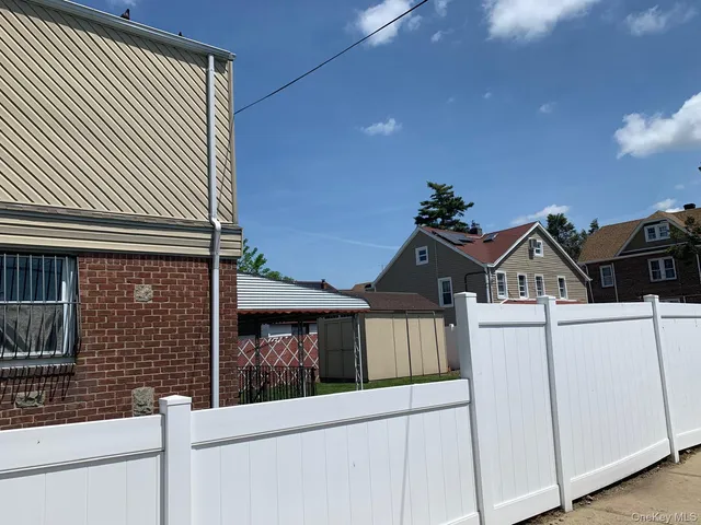 a front view of a house with a garage