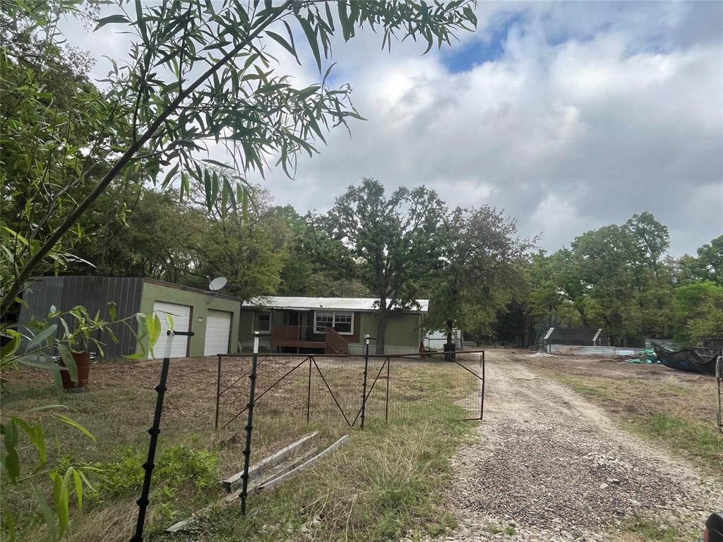 1466 Rancho Road Quinlan, TX 75474 - Photo 2 of 31